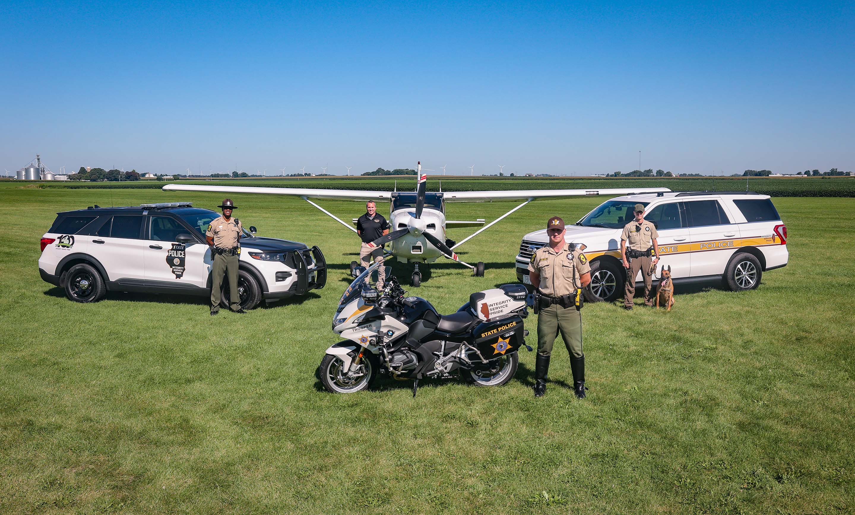 Troopers Raising American Flag